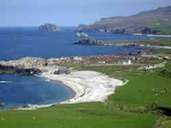 Die wilde Felsküste Irlands kennt man von vielen Bildern. Die Sanddünen am Malin Head sind dagegen ein eher ungewöhnliches Motiv. Foto: Tourism Ireland Die wilde Felsküste Irlands kennt man von vielen Bildern. Die Sanddünen am Malin Head sind dagegen ein eher ungewöhnliches Motiv. Foto: Tourism Ireland